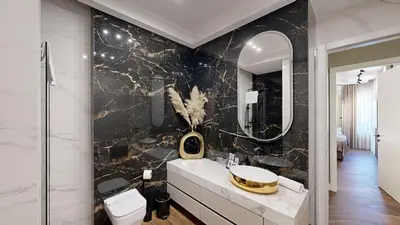 a bathroom with a sink and a mirror at Ideal Apartments in Banja Luka