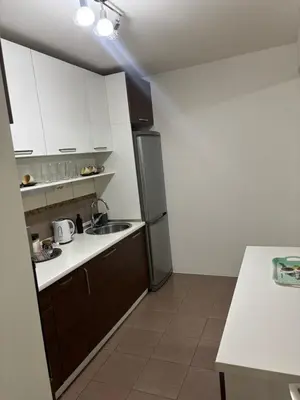a kitchen with a sink and a refrigerator at Apartman Centar in Banja Luka