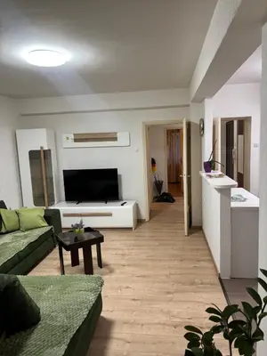 a living room with a couch and a table at Apartman Centar in Banja Luka