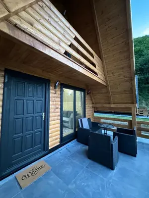 a room with a door and a patio at Plivska vila 2 in Jajce