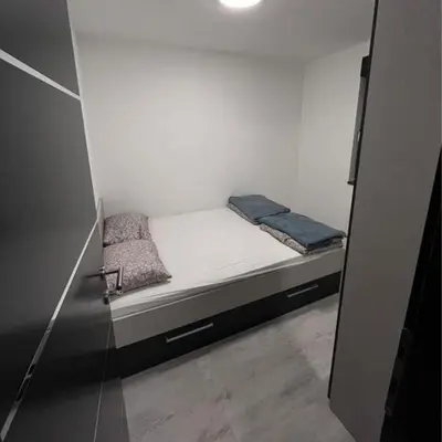 a small bedroom with a bed in a room at Villa Imperia for rent - Banja Luka Krupa na Vrbasu in Krupa na Vrbasu