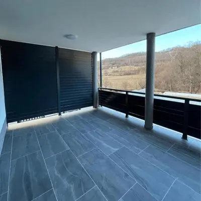 a balcony with a large window with a view at Villa Imperia for rent - Banja Luka Krupa na Vrbasu in Krupa na Vrbasu