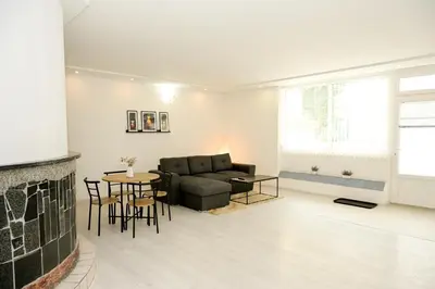 a living room with a couch and a table at Apartman Leo Jajce in Jajce