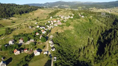 an aerial view of a small village on a hill at Villa Maglić Vlašić in Vlasic