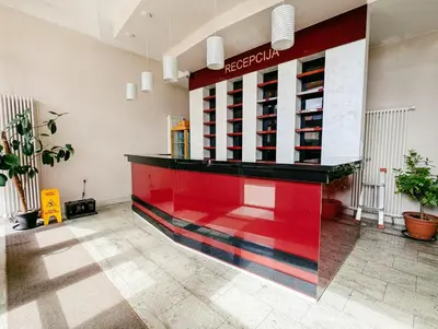 a store with a red counter in a room at Motel Dačo in Stara Bila
