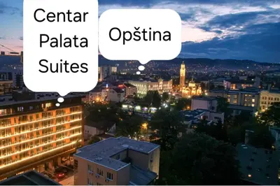 a view of a city at night with the words central palaia and o at Palata Suite in Banja Luka