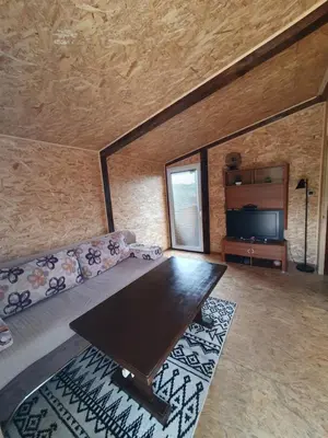 a living room with a couch and a table at Blanca 6 in Nova Bila