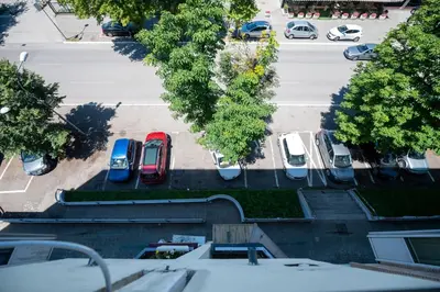 an aerial view of a parking lot with cars parked at Apartman Magija in Banja Luka