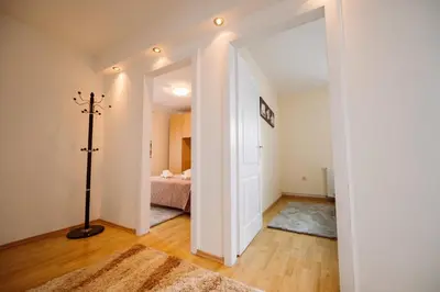 a room with a bedroom with a bed at Apartman Eni in Livno