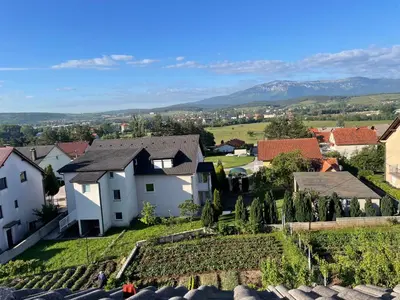 a view of a small village with houses and trees at Apartman Eni in Livno
