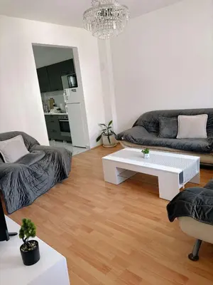 a living room with a couch and a coffee table at Vacation Home Maja in Visoko