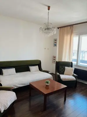 a living room with two couches and a coffee table at Vacation Home Maja in Visoko