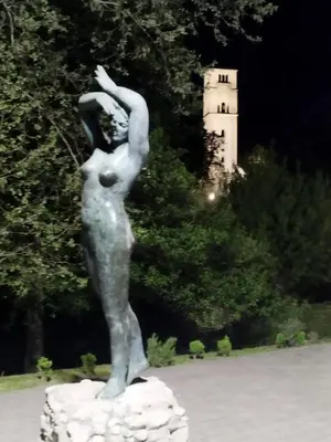 a statue of a woman standing on a rock at Lena Exclusive in Bihać