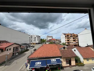 a view from a window of a town with buildings at Dora Apartman in Banja Luka