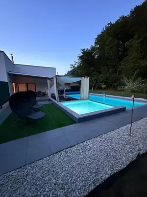 a house with a swimming pool in the backyard at Residence Deluxe Ljubijankici in Ljubijankići