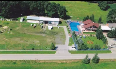 an aerial view of a house on a hill at Camping Stevin ranc in Bosanska Dubica
