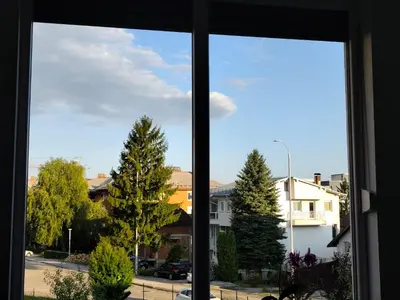 an open window with a view of a street at Sokak Apartman in Bihać