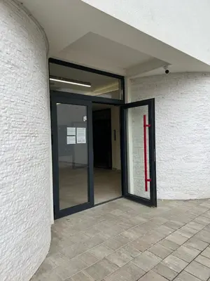 an open door with a red cross in a building at Max stan na dan Doboj in Doboj
