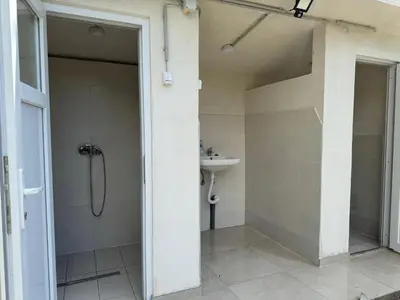 a bathroom with a shower and a sink at Dream House Šeha in Bihać