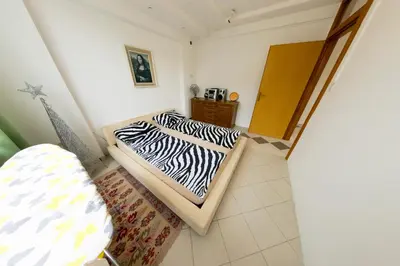 a bedroom with two beds in a room at Apartman MIŠKO in Bihać