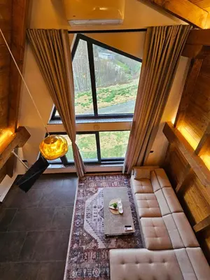 an overhead view of a living room with a large window at Luxury Villa Mašić - 2 in Bugojno