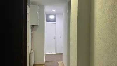 a hallway with a door leading into a room at Apartment 3A Visoko in Visoko