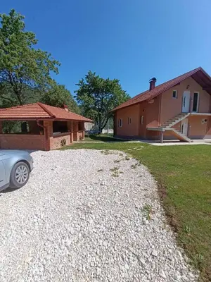 a car parked in front of a house at Oaza mira Šipovo in Šipovo