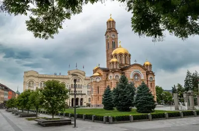 a building with a clock tower on top of it at Banjaluka Centar1 in Banja Luka
