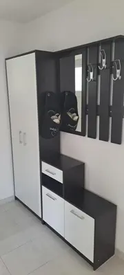 a room with a closet with shoes in it at Apartmani Donji Vakuf in Donji Vakuf