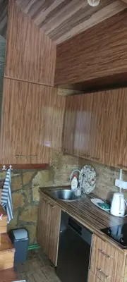 a kitchen with a sink and a counter top at Weekend house Mali Raj in Visoko
