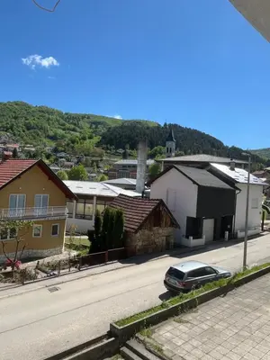 a car parked on the side of a street at Apartman Filip in Jajce