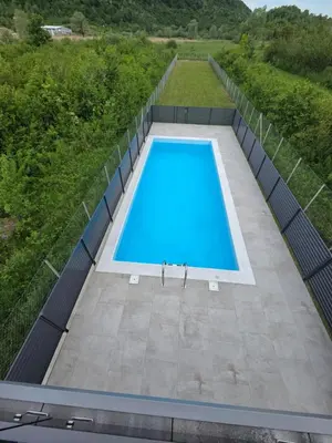 an overhead view of a swimming pool on a patio at Villa Alisa in Bihać