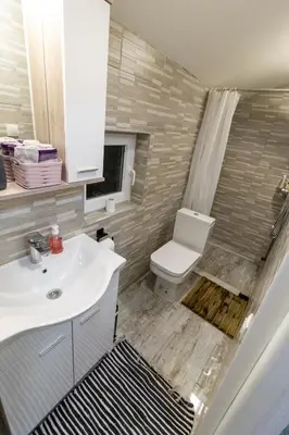 a bathroom with a sink and a toilet at Guest House Lejla 2 in Travnik