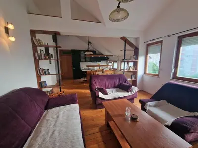 a living room with two couches and a coffee table at Apartman Sofija 2 in Banja Luka