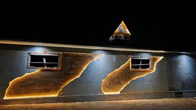 a building with two windows on the side of it at Holiday Residence Šehić in Visoko