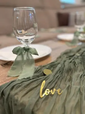 a wine glass sitting on top of a table at Holiday Residence Šehić in Visoko