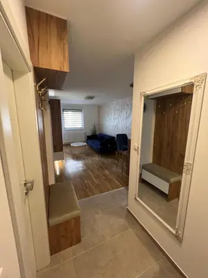 a view of a living room from the hallway at Elita Apartmani in Ivišovo Greblje