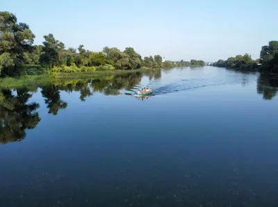 a group of people in a boat on a river at Apartmani Una Lux2 in Spilja