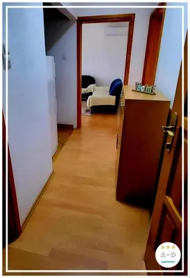 an open door to a room with a living room at Apartman A-D in Bihać