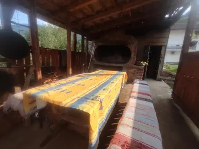 a large bed in a room in a barn at Bad and Breakfast Majestik in Gornji Ribnik