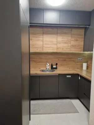 a bathroom with a sink and a counter at Apartman 3 Tuzla in Tuzla