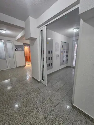 an empty room with a door open in a building at Apartment STELLA in Bihać