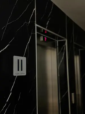 a elevator in a building with a sign on it at Apartment Rosa Brandis in Travnik