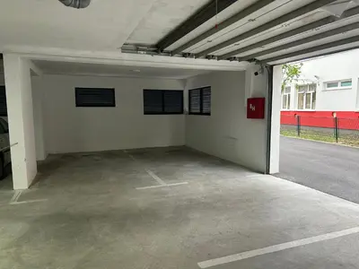 an empty garage with a parking lot at Prima in Bosanska Dubica