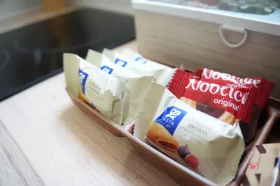 a container of food sitting on a table at Studio apartman Ivica in Jajce