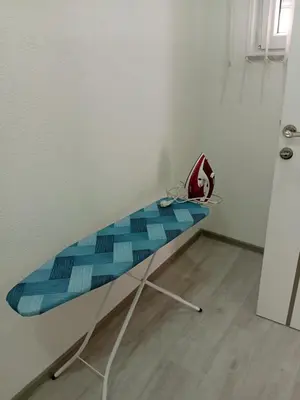 a table in the corner of a room at Apartman Volijak 44 in Jajce