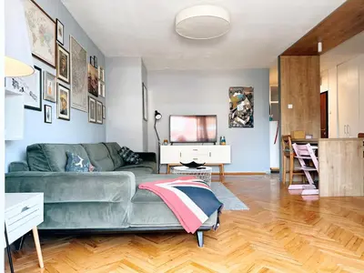 a living room with a couch and a table at Apartman Lorka in Banja Luka