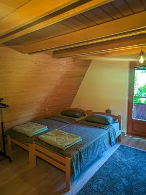 a bedroom with two beds in a room at Vikendica Stella in Bihać