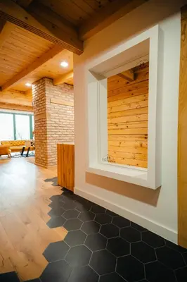 a room with a wall with a window at Villa Dos Padrinos in Banja Luka