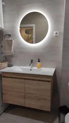 a bathroom with a sink and a mirror at Apartment Lena 51 in Banja Luka